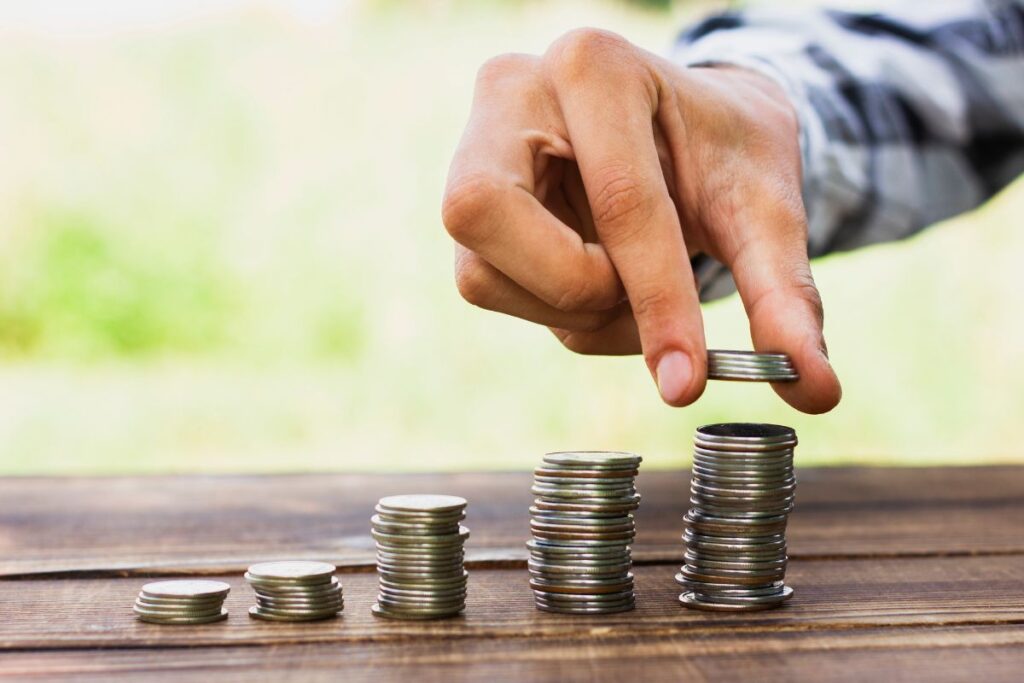 coins stacked on table resembling affordiblity